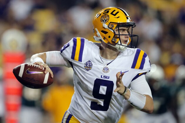 LSU quarterback Joe Burrow (9) scrambles as he looks for a receiver in the second half of an NCAA college football game against Southeastern Louisiana in Baton Rouge, La., Saturday, Sept. 8, 2018. LSU won 31-0. (AP Photo/Gerald Herbert)