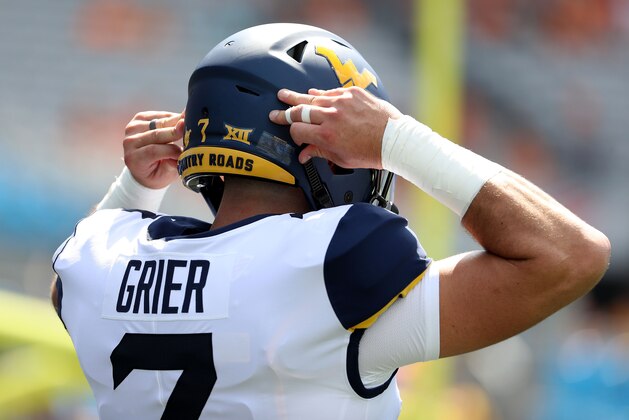 CHARLOTTE, NC - SEPTEMBER 01: Will Grier #7 of the West Virginia Mountaineers warms up before their game against the Tennessee Volunteers at Bank of America Stadium on September 1, 2018 in Charlotte, North Carolina. (Photo by Streeter Lecka/Getty Images) CHARLOTTE, NC - SEPTEMBER 01: Will Grier #7 of the West Virginia Mountaineers warms up before their game against the Tennessee Volunteers at Bank of America Stadium on September 1, 2018 in Charlotte, North Carolina. (Photo by Streeter Lecka/Getty Images)