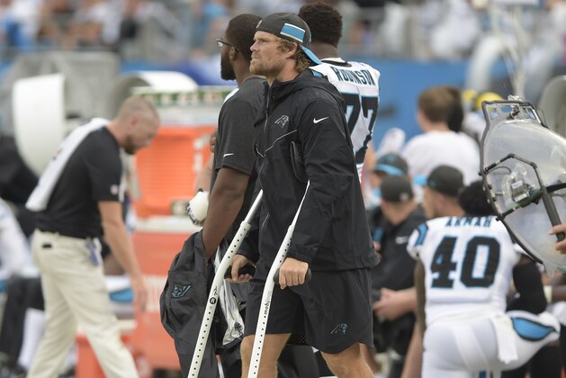 Carolina Panthers' Greg Olsen watches the action from the sidelines during the second half of an NFL football game against the Dallas Cowboys in Charlotte, N.C., Sunday, Sept. 9, 2018. (AP Photo/Mike McCarn)