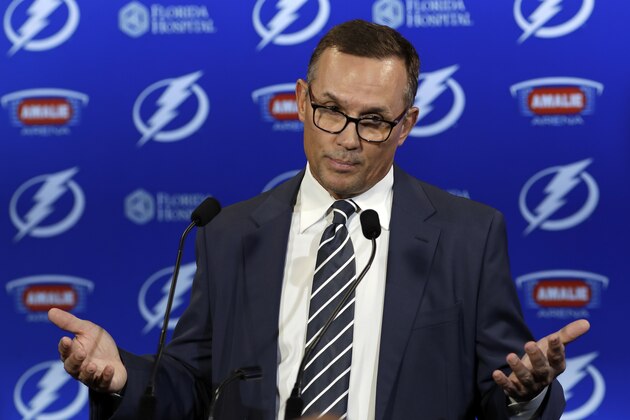 Tampa Bay Lightning general manager Steve Yzerman gestures during a news conference before an NHL hockey game against the Toronto Maple Leafs, Monday, Feb. 26, 2018, in Tampa, Fla. Yzerman was discussing acquiring Ryan McDonagh and J.T. MIller in a trade with the New York Rangers. (AP Photo/Chris O'Meara)