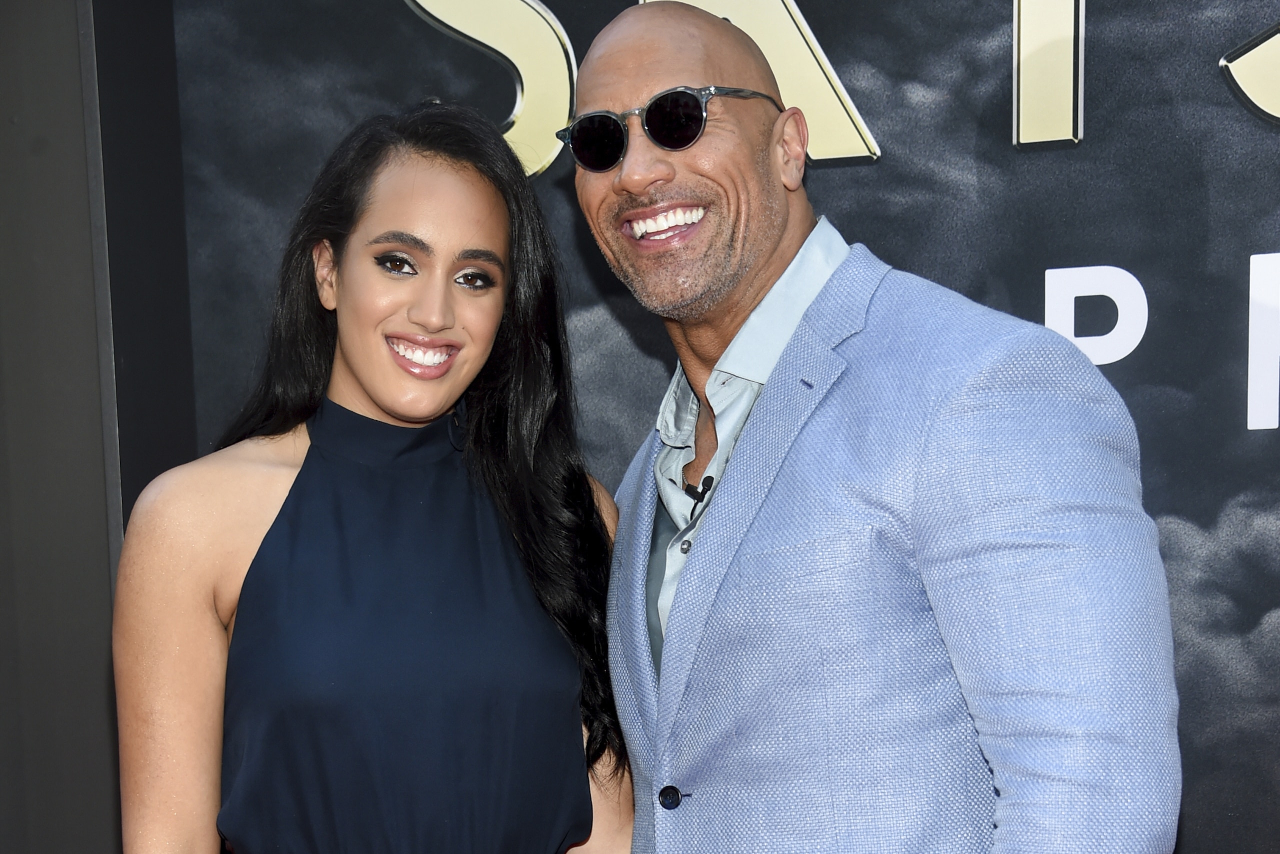 Actor Dwayne Johnson and daughter Simone Johnson attend the