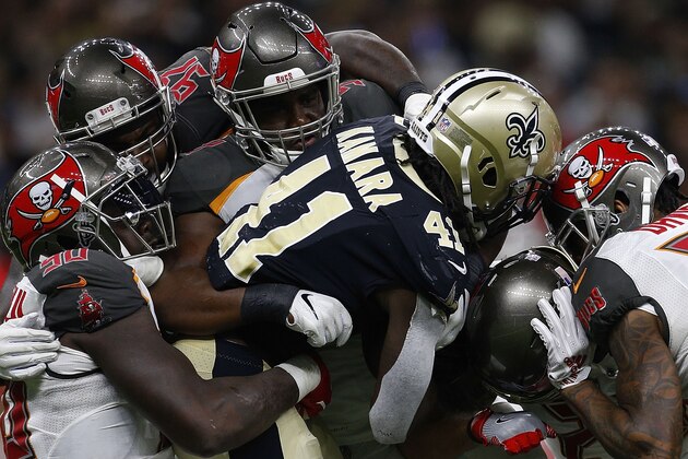 NEW ORLEANS, LA - SEPTEMBER 09: Alvin Kamara #41 of the New Orleans Saints is tackled by the Tampa Bay Buccaneers defense during the second half at the Mercedes-Benz Superdome on September 9, 2018 in New Orleans, Louisiana.  (Photo by Jonathan Bachman/Getty Images)