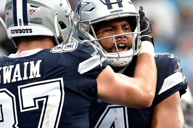 CHARLOTTE, NC - SEPTEMBER 09:  Dak Prescott #4 of the Dallas Cowboys celebrates a two point conversion against the Carolina Panthers in the fourth quarter during their game at Bank of America Stadium on September 9, 2018 in Charlotte, North Carolina.  (Photo by Grant Halverson/Getty Images)