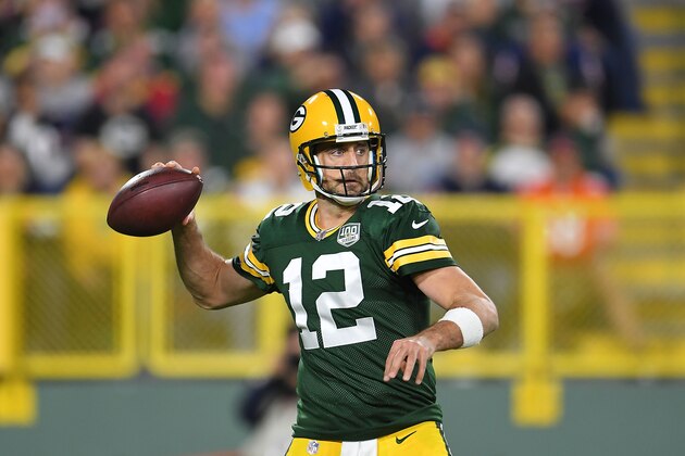 GREEN BAY, WI - SEPTEMBER 09:  Aaron Rodgers #12 of the Green Bay Packers drops back to pass during a game against the Chicago Bears at Lambeau Field on September 9, 2018 in Green Bay, Wisconsin.  (Photo by Stacy Revere/Getty Images)