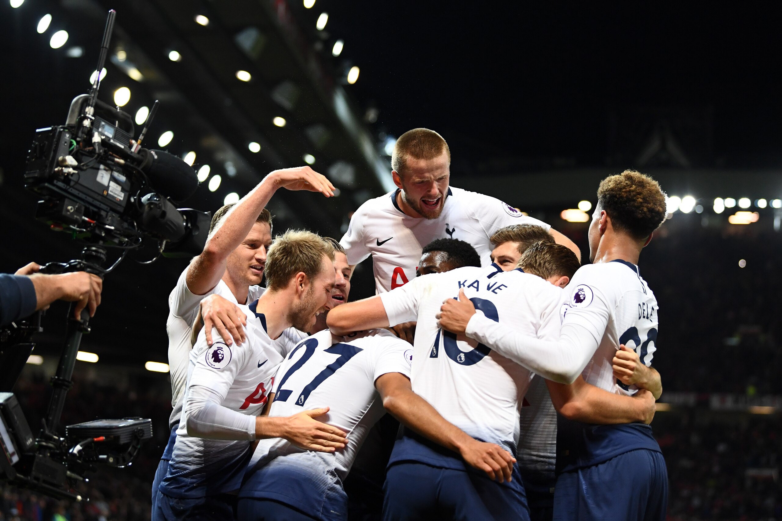 MANCHESTER, ENGLAND - AUGUST 27:  Lucas Moura of Tottenham Hotspur (hidden) celebrates with team mates after scoring his second goal and his team's third goal during the Premier League match between Manchester United and Tottenham Hotspur at Old Trafford on August 27, 2018 in Manchester, United Kingdom.  (Photo by Clive Mason/Getty Images)