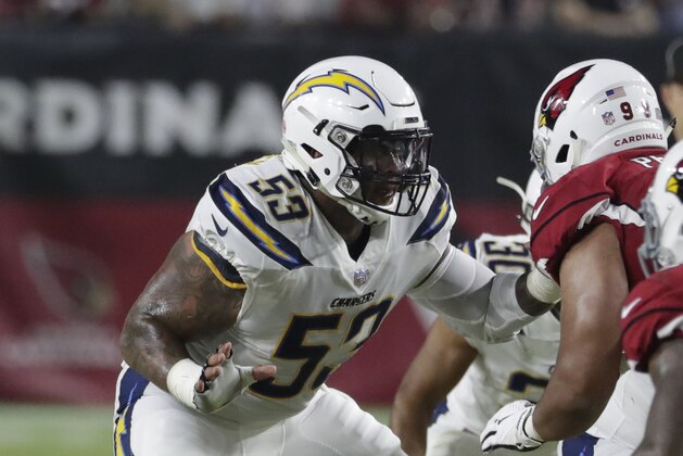 Los Angeles Chargers center Mike Pouncey (53) during the first half of an preseason NFL football game against the Arizona Cardinals, Saturday, Aug. 11, 2018, in Glendale, Ariz. (AP Photo/Rick Scuteri)
