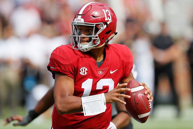 TUSCALOOSA, AL - SEPTEMBER 08:  Tua Tagovailoa #13 of the Alabama Crimson Tide rolls out against the Arkansas State Red Wolves at Bryant-Denny Stadium on September 8, 2018 in Tuscaloosa, Alabama.  (Photo by Kevin C. Cox/Getty Images)