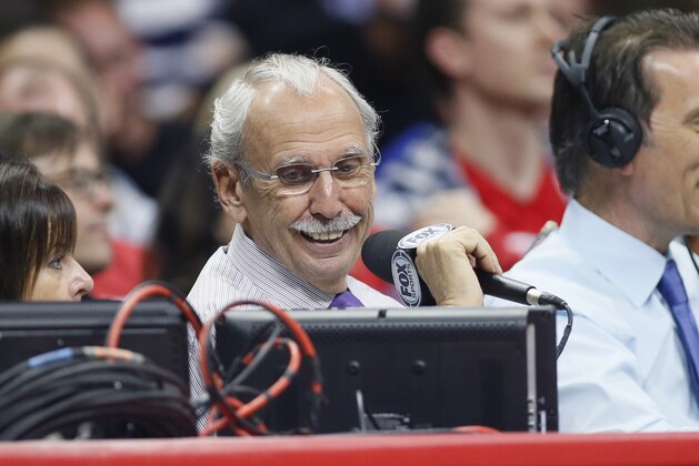 Play-by-play announcer Ralph Lawler works the NBA basketball game courtside between the Memphis Grizzlies and Los Angeles Clippers at the Staples Center, Saturday, April 11, 2015, in Los Angeles. (AP Photo/Danny Moloshok)