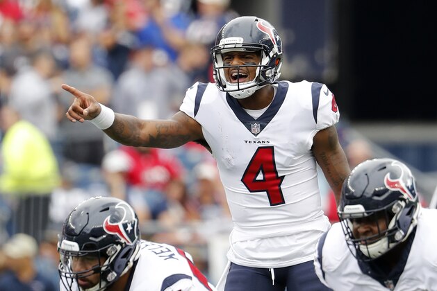 Houston Texans quarterback Deshaun Watson points at the line of scrimmage during an NFL football game against the New England Patriots at Gillette Stadium in Foxborough, Mass. Sunday, Sept. 9, 2018. (Winslow Townson/AP Images for Panini)