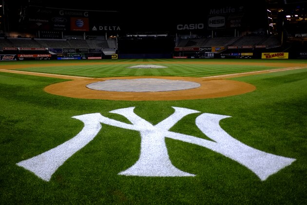 The New York Yankees logo is seen behind home plate at Yankee Stadium in New York following a baseball game against the Oakland Athletics, Friday, May 3, 2013. The Athletics won 2-0. (AP Photo/Julio Cortez)