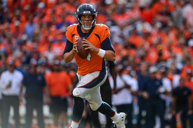 DENVER, CO - SEPTEMBER 9:  Quarterback Case Keenum #4 of the Denver Broncos rolls out of the pocket against the Seattle Seahawks at Broncos Stadium at Mile High on September 9, 2018 in Denver, Colorado. (Photo by Dustin Bradford/Getty Images)