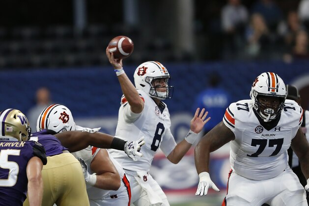 Auburn Tigers quarterback Jarrett Stidham (8) throws a pass in the first half of an NCAA college football game against Washington Saturday, Sept. 1, 2018, in Atlanta. (AP Photo/John Bazemore)