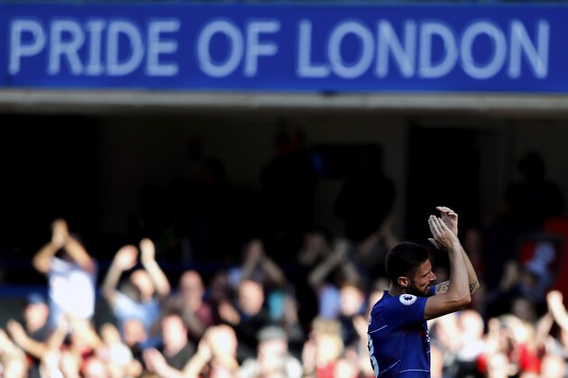 Chelsea's Olivier Giroud applauds to supporters after the English Premier League soccer match between Chelsea and Bournemouth at Stamford Bridge stadium in London, Saturday, Sept. 1, 2018.(AP Photo/Frank Augstein)