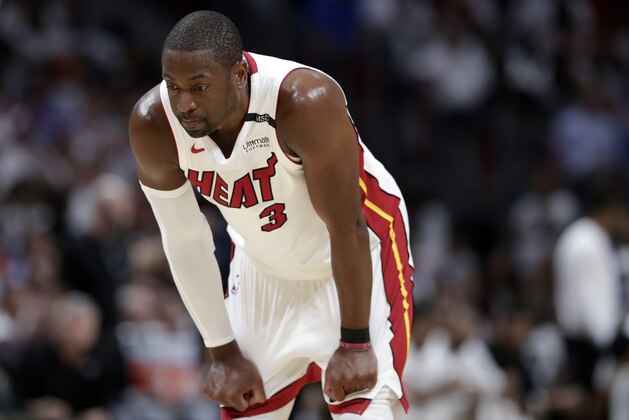 Miami Heat's Dwyane Wade (3) stands on the court during the second half of Game 3 of a first-round NBA basketball playoff series against the Philadelphia 76ers, Thursday, April 19, 2018, in Miami. The 76ers won 128-108. (AP Photo/Lynne Sladky)