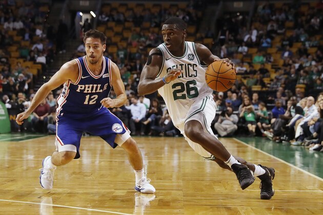 Boston Celtics' Jabari Bird drives during the second half of Boston's 113-96 win over the Philadelphia 76ers in a preseason NBA basketball game in Boston Monday, Oct. 9, 2017. (AP Photo/Winslow Townson)