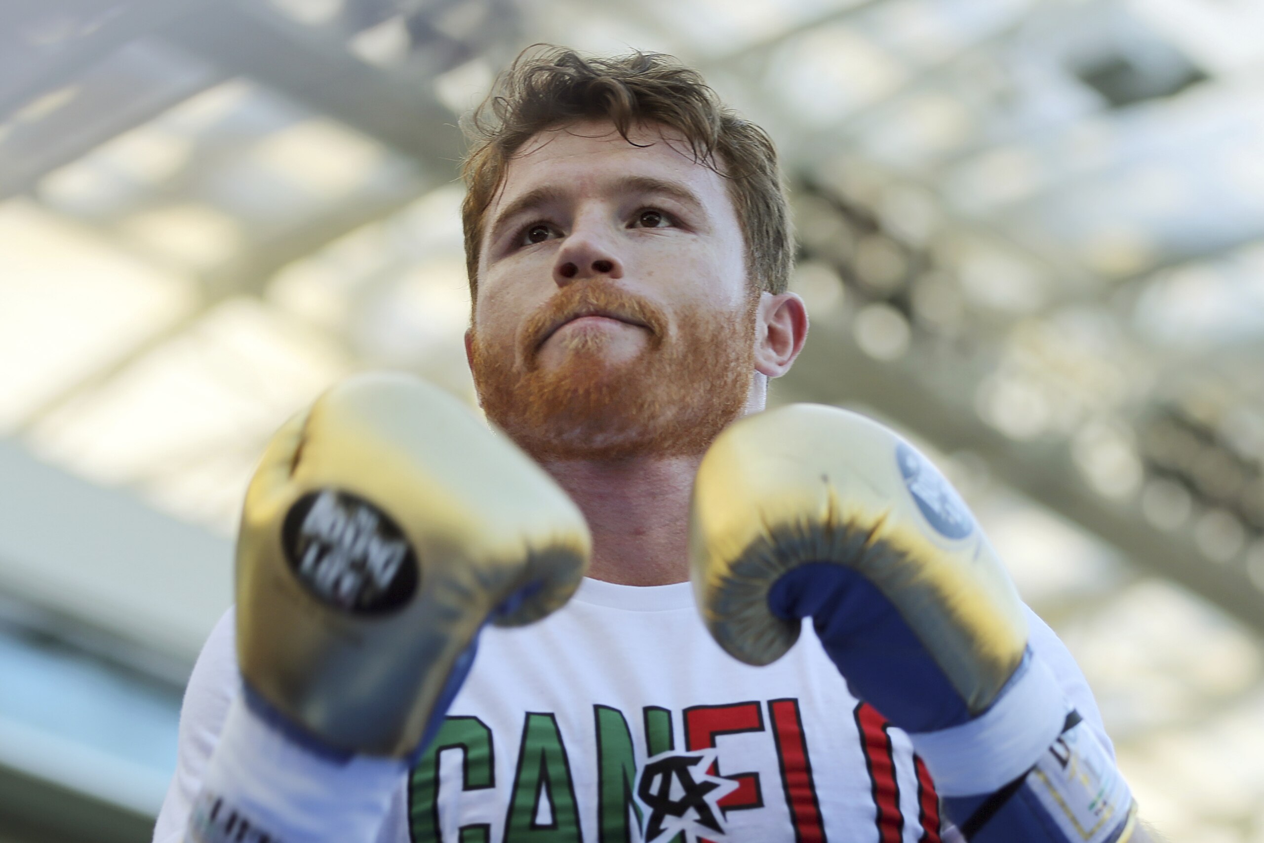 In this Sunday, Aug. 26, 2018, photo, middleweight Canelo Alvarez appears at a public workout at Banc of California Stadium in Los Angeles. Alvarez is eager for his rematch with Gennady Golovkin on Sept. 15 in Las Vegas after the middleweight stars fought to a draw last year. Alvarez is training in San Diego after attributing his failed doping test last March to eating tainted meat in Mexico. (AP Photo/Reed Saxon)