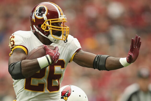 GLENDALE, AZ - SEPTEMBER 09:  Running back Adrian Peterson #26 of the Washington Redskins rushes the football against the Arizona Cardinals during the NFL game at State Farm Stadium on September 9, 2018 in Glendale, Arizona. The Redskins defeated the Cardinals 24-6.  (Photo by Christian Petersen/Getty Images)