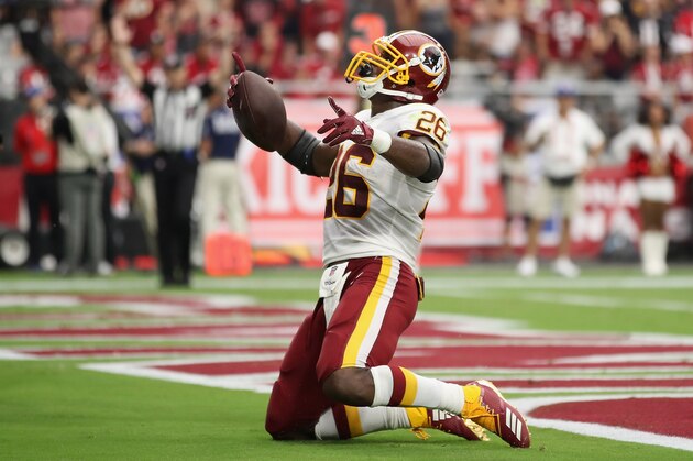 GLENDALE, AZ - SEPTEMBER 09:  Running back Adrian Peterson #26 of the Washington Redskins scores on a one yard rushing touchdown against the Arizona Cardinals during the NFL game at State Farm Stadium on September 9, 2018 in Glendale, Arizona.  (Photo by Christian Petersen/Getty Images)