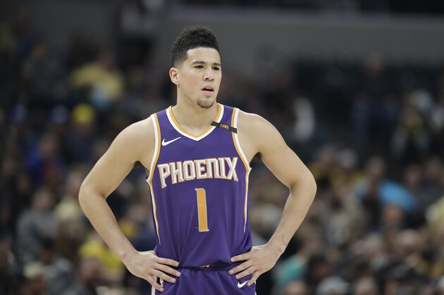 Phoenix Suns' Devin Booker in action during the first half of an NBA basketball game against the Indiana Pacers, Wednesday, Jan. 24, 2018, in Indianapolis. (AP Photo/Darron Cummings)