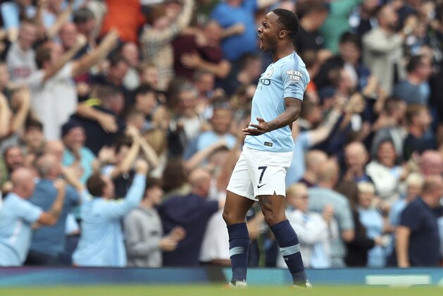Manchester City's Raheem Sterling celebrates after scoring the opening goal during the English Premier League soccer match between Manchester City and Newcastle United at the Etihad Stadium in Manchester, England, Saturday, Sept. 1, 2018. (AP Photo/Jon Super)