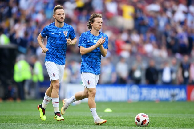 MOSCOW, RUSSIA - JULY 15:  Ivan Rakitic and Luka Modric of Croatia walk on the pitch for the warm up prior to the 2018 FIFA World Cup Final between France and Croatia at Luzhniki Stadium on July 15, 2018 in Moscow, Russia.  (Photo by Laurence Griffiths/Getty Images)