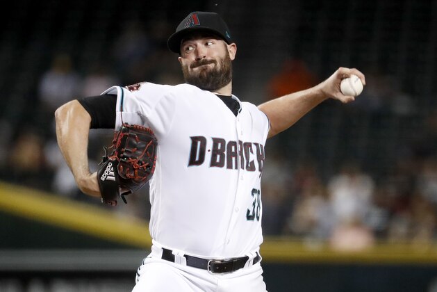 Arizona Diamondbacks starting pitcher Robbie Ray (38) throws against the San Diego Padres during the fifth inning of a baseball game, Tuesday, Sept. 4, 2018, in Phoenix. (AP Photo/Matt York)