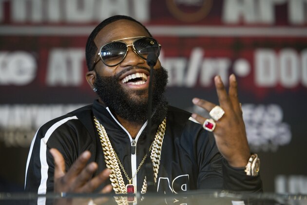 Four-division world champion Adrien Broner talks about his upcoming world title fight with Ashley Theophane, Monday, Feb. 29, 2016, during a news conference in Washington. The fight is scheduled to be held April, 1, 2016 at the D.C. Armory. (AP Photo/Cliff Owen)