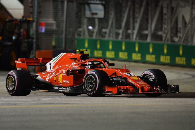 Ferrari's Finnish driver Kimi Raikkonen drives at the Marina Bay Street Circuit during the second practice session ahead of the Singapore Formula One Grand Prix in Singapore on September 14, 2018. (Photo by Roslan RAHMAN / AFP)        (Photo credit should read ROSLAN RAHMAN/AFP/Getty Images)