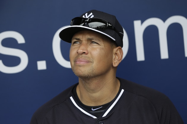 FILE - In this Feb. 26, 2015, file photo, New York Yankees' Alex Rodriguez sits in the dugout during a spring training baseball workout in Tampa, Fla. Rodriguez is back on the field for the New York Yankees in his new role as an instructor.  A-Rod arrived Friday, Sept. 30, 2016, at the Yankees' minor league complex in Tampa, to work with prospects taking part in instructional league.  (AP Photo/Lynne Sladky, File)