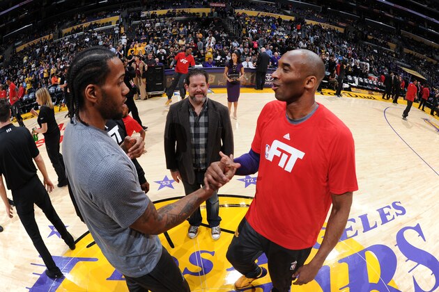 LOS ANGELES, CA - JANUARY 22: Kawhi Leonard #2 of the San Antonio Spurs and Kobe Bryant #24 of the Los Angeles Lakers before the game on January 22, 2016 at STAPLES Center in Lost Angeles, California. NOTE TO USER: User expressly acknowledges and agrees that, by downloading and or using this Photograph, user is consenting to the terms and conditions of the Getty Images License Agreement. Mandatory Copyright Notice: Copyright 2016 NBAE (Photo by Andrew Bernstein/NBAE via Getty Images)