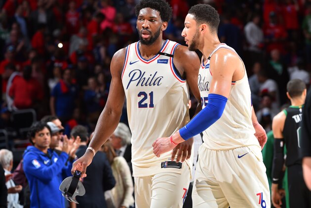 PHILADELPHIA, PA - MAY 7: Joel Embiid #21 and Ben Simmons #25 of the Philadelphia 76ers talk during Game Four of the Eastern Conference Semifinals of the 2018 NBA Playoffs on May 5, 2018 at Wells Fargo Center in Philadelphia, Pennsylvania. NOTE TO USER: User expressly acknowledges and agrees that, by downloading and or using this photograph, User is consenting to the terms and conditions of the Getty Images License Agreement. Mandatory Copyright Notice: Copyright 2018 NBAE (Photo by Jesse D. Garrabrant/NBAE via Getty Images)