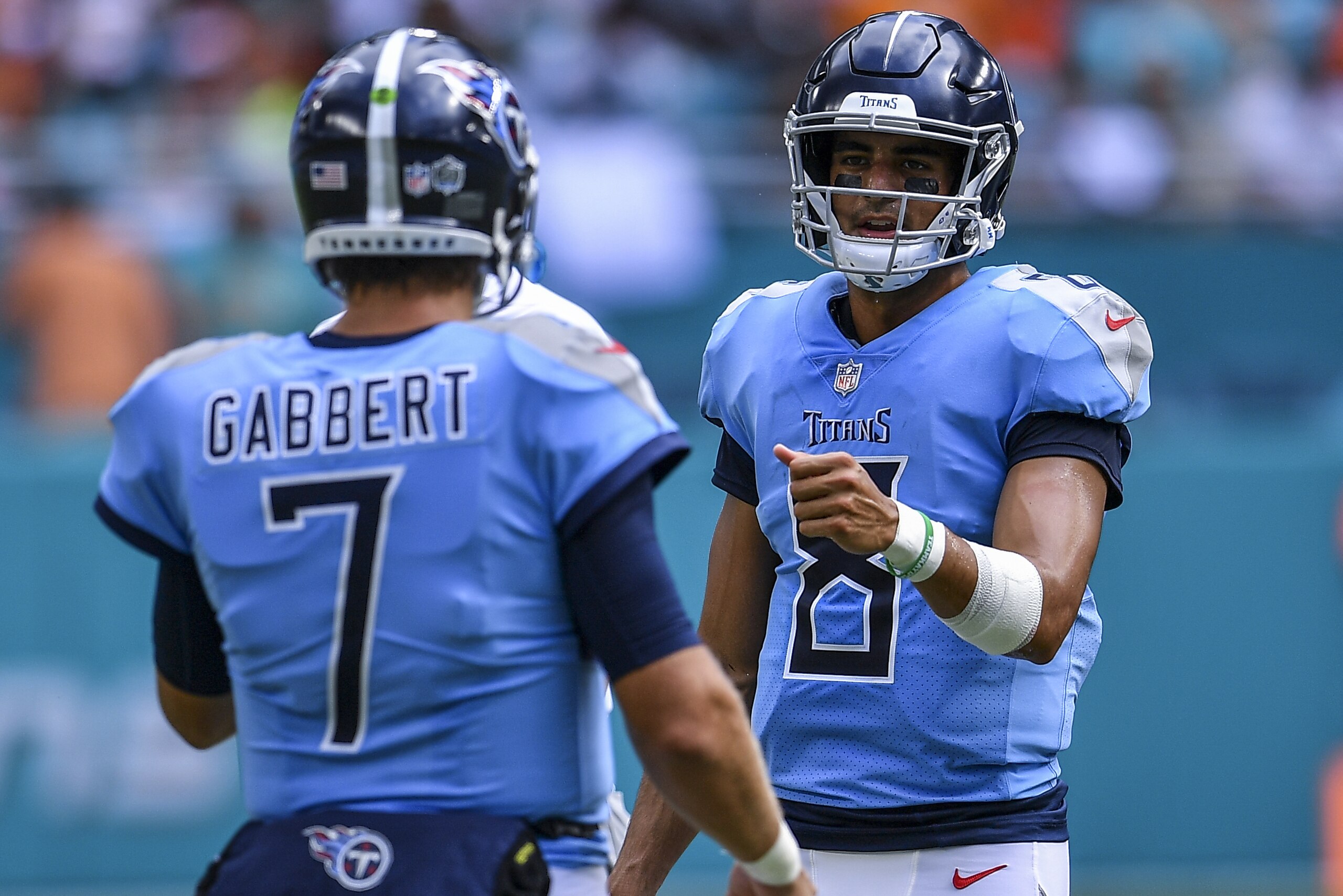 MIAMI, FL - SEPTEMBER 09: Marcus Mariota high fives Blaine Gabbert #7 of the Tennessee Titans after entering the game against the Miami Dolphins at Hard Rock Stadium on September 9, 2018 in Miami, Florida. (Photo by Mark Brown/Getty Images)