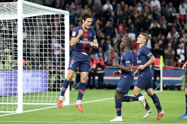 PARIS, FRANCE - SEPTEMBER 14:  Edinson Cavani of Paris Saint-Germain celebrates his goal with Moussa Diaby and Marco Verratti during the French Ligue 1 match between Paris Saint Germain and AS Saint Etienne on September 14, 2018 in Paris, France.  (Photo by Xavier Laine/Getty Images)