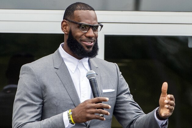 FILE - In this Monday, July 30, 2018, file photo, LeBron James speaks at the opening ceremony for the I Promise School in Akron, Ohio. James says he