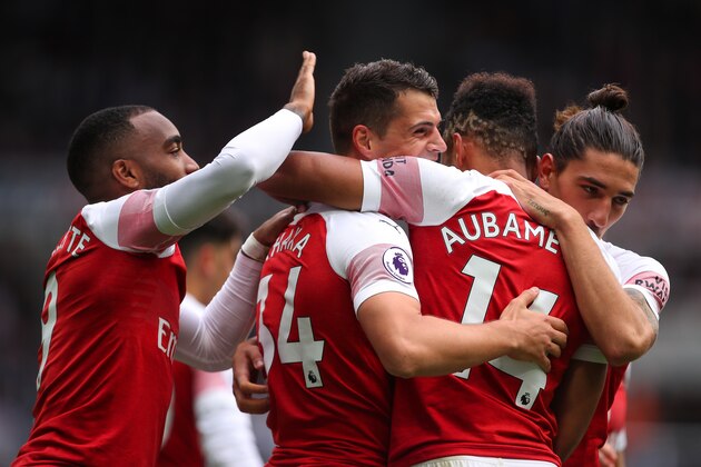 NEWCASTLE UPON TYNE, ENGLAND - SEPTEMBER 15:  Granit Xhaka of Arsenal celebrates after scoring a goal to make it 0-1 during the Premier League match between Newcastle United and Arsenal FC at St. James Park on September 15, 2018 in Newcastle upon Tyne, United Kingdom. (Photo by Robbie Jay Barratt - AMA/Getty Images)