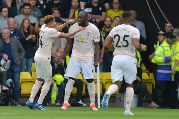 Manchester United's Belgian striker Romelu Lukaku (C) celebrates after scoring during the English Premier League football match between Watford and Manchester United at Vicarage Road Stadium in Watford, north of London on September 15, 2018. (Photo by OLLY GREENWOOD / AFP) / RESTRICTED TO EDITORIAL USE. No use with unauthorized audio, video, data, fixture lists, club/league logos or 'live' services. Online in-match use limited to 120 images. An additional 40 images may be used in extra time. No video emulation. Social media in-match use limited to 120 images. An additional 40 images may be used in extra time. No use in betting publications, games or single club/league/player publications. /         (Photo credit should read OLLY GREENWOOD/AFP/Getty Images)