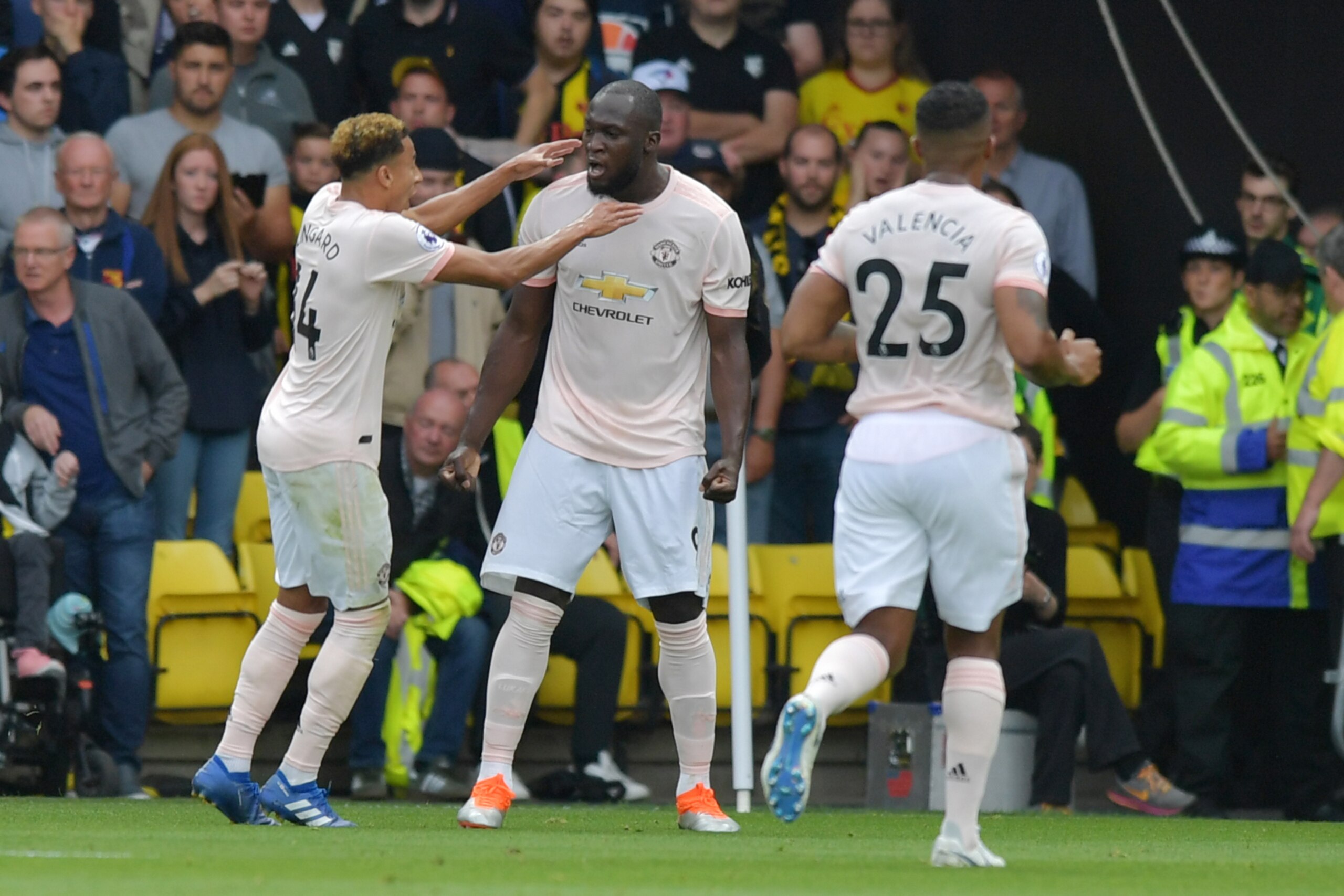 Manchester United's Belgian striker Romelu Lukaku (C) celebrates after scoring during the English Premier League football match between Watford and Manchester United at Vicarage Road Stadium in Watford, north of London on September 15, 2018. (Photo by OLLY GREENWOOD / AFP) / RESTRICTED TO EDITORIAL USE. No use with unauthorized audio, video, data, fixture lists, club/league logos or 'live' services. Online in-match use limited to 120 images. An additional 40 images may be used in extra time. No video emulation. Social media in-match use limited to 120 images. An additional 40 images may be used in extra time. No use in betting publications, games or single club/league/player publications. /         (Photo credit should read OLLY GREENWOOD/AFP/Getty Images)