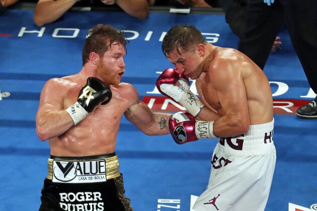 LAS VEGAS, NV - SEPTEMBER 15: Saul Canelo Alvarez and Gennady Golovkin fight during the WBC-WBA-IBO Ring Middleweight Title bout at T-Mobile Arena on September 15, 2018 in Las Vegas, Nevada. (Photo by Omar Vega/Getty Images)