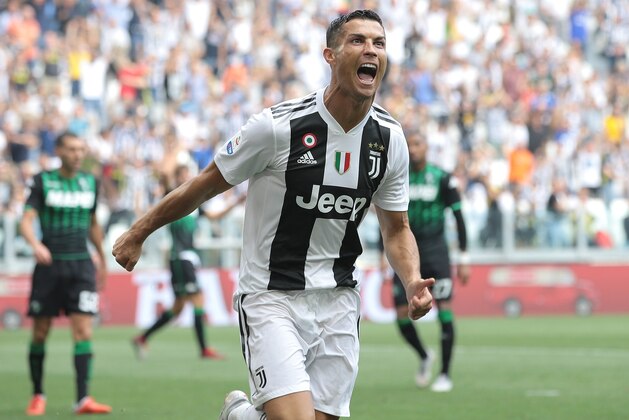 TURIN, ITALY - SEPTEMBER 16:  Cristiano Ronaldo of Juventus FC celebrates after scoring the opening goal during the serie A match between Juventus and US Sassuolo at Allianz Stadium on September 16, 2018 in Turin, Italy.  (Photo by Emilio Andreoli/Getty Images)