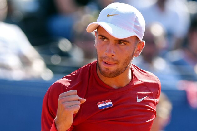 Croatia's tennis player Borna Coric celebrates a point against his opponent US Frances Tiafoe during the Davis Cup semi-final tennis match between Croatia and the US at Sport Centre Visnjik in Zadar on September 16, 2018. (Photo by STR / AFP)        (Photo credit should read STR/AFP/Getty Images)