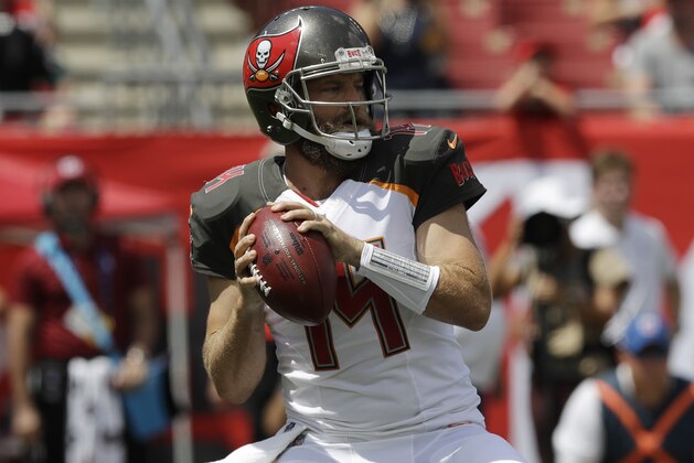 Tampa Bay Buccaneers quarterback Ryan Fitzpatrick (14) looks to pass,during the first half of an NFL football against the Philadelphia Eagles, Sunday, Sept. 16, 2018, in Tampa, Fla. (AP Photo/Chris O'Meara)