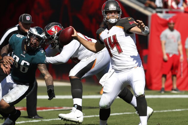 Tampa Bay Buccaneers quarterback Ryan Fitzpatrick (14) looks to pass, during the second half of an NFL football gam against the Philadelphia Eagles, Sunday, Sept. 16, 2018, in Tampa, Fla. (AP Photo/Mark LoMoglio)