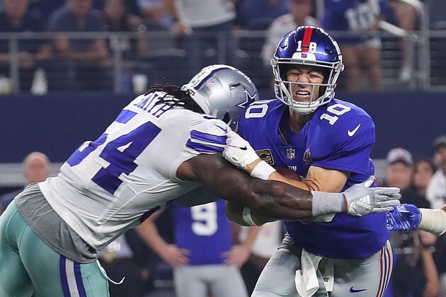 ARLINGTON, TX - SEPTEMBER 16:  Jaylon Smith #54 of the Dallas Cowboys hits Eli Manning #10 of the New York Giants in the third quarter at AT&T Stadium on September 16, 2018 in Arlington, Texas.  (Photo by Tom Pennington/Getty Images)