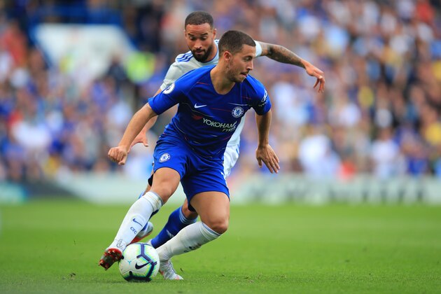 LONDON, ENGLAND - SEPTEMBER 15: Eden Hazard of Chelsea in action with Jazz Richards of Cardiff City during the Premier League match between Chelsea FC and Cardiff City at Stamford Bridge on September 15, 2018 in London, United Kingdom. (Photo by Marc Atkins/Getty Images)