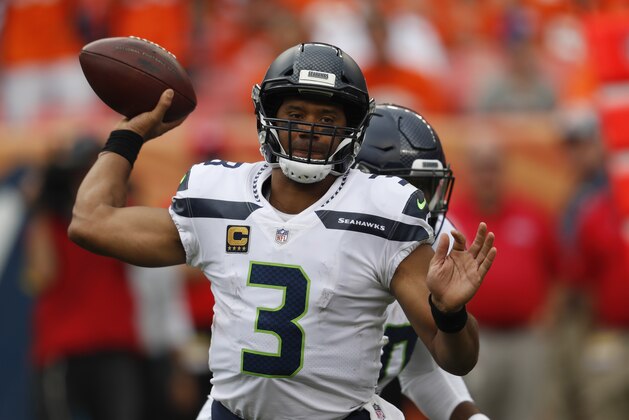 Seattle Seahawks quarterback Russell Wilson throws a pass during the second half of an NFL football game against the Denver Broncos, Sunday, Sept. 9, 2018, in Denver. (AP Photo/David Zalubowski)