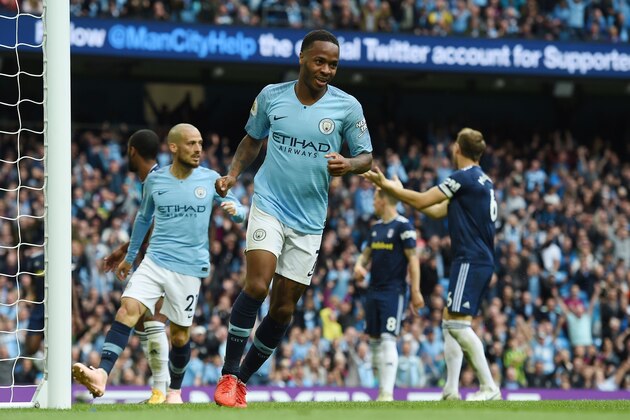 Manchester City's English midfielder Raheem Sterling celebrates after scoring their third goal during the English Premier League football match between Manchester City and Fulham at the Etihad Stadium in Manchester, north west England, on September 15, 2018. (Photo by Paul ELLIS / AFP) / RESTRICTED TO EDITORIAL USE. No use with unauthorized audio, video, data, fixture lists, club/league logos or 'live' services. Online in-match use limited to 120 images. An additional 40 images may be used in extra time. No video emulation. Social media in-match use limited to 120 images. An additional 40 images may be used in extra time. No use in betting publications, games or single club/league/player publications. /         (Photo credit should read PAUL ELLIS/AFP/Getty Images)