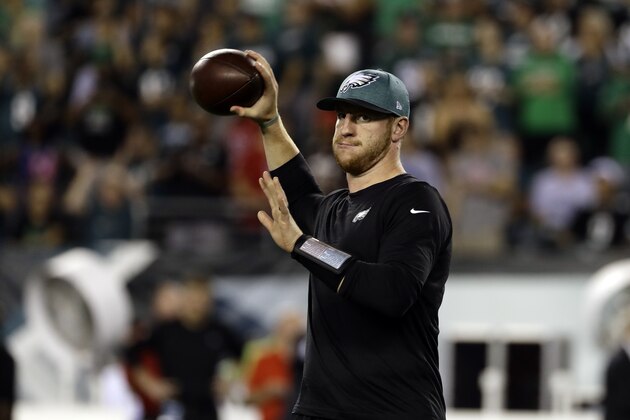 Philadelphia Eagles' Carson Wentz warms up before an NFL football game against the Atlanta Falcons, Thursday, Sept. 6, 2018, in Philadelphia. (AP Photo/Michael Perez)