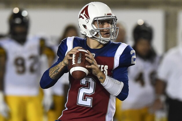 MONTREAL, QC - AUGUST 03:  Quarterback Johnny Manziel #2 of the Montreal Alouettes prepares to play the ball against the Hamilton Tiger-Cats during the CFL game at Percival Molson Stadium on August 3, 2018 in Montreal, Quebec, Canada.  The Hamilton Tiger-Cats defeated the Montreal Alouettes 50-11.  (Photo by Minas Panagiotakis/Getty Images)
