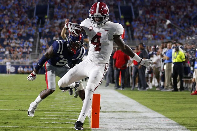OXFORD, MS - SEPTEMBER 15: Jerry Jeudy #4 of the Alabama Crimson Tide runs with the ball as Montrell Custis #2 of the Mississippi Rebels defends during the first half at Vaught-Hemingway Stadium on September 15, 2018 in Oxford, Mississippi. Jeudy was ruled out of bounds before crossing the goal line. (Photo by Jonathan Bachman/Getty Images)