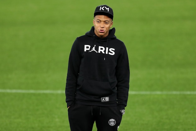 LIVERPOOL, ENGLAND - SEPTEMBER 17:  Kylian Mbappe of Paris Saint-Germain looks on as Paris Saint-Germain walks the pitch on the eve of their UEFA Champions League Match against Liverpool at Anfield on September 17, 2018 in Liverpool, England.  (Photo by Mark Robinson/Getty Images)